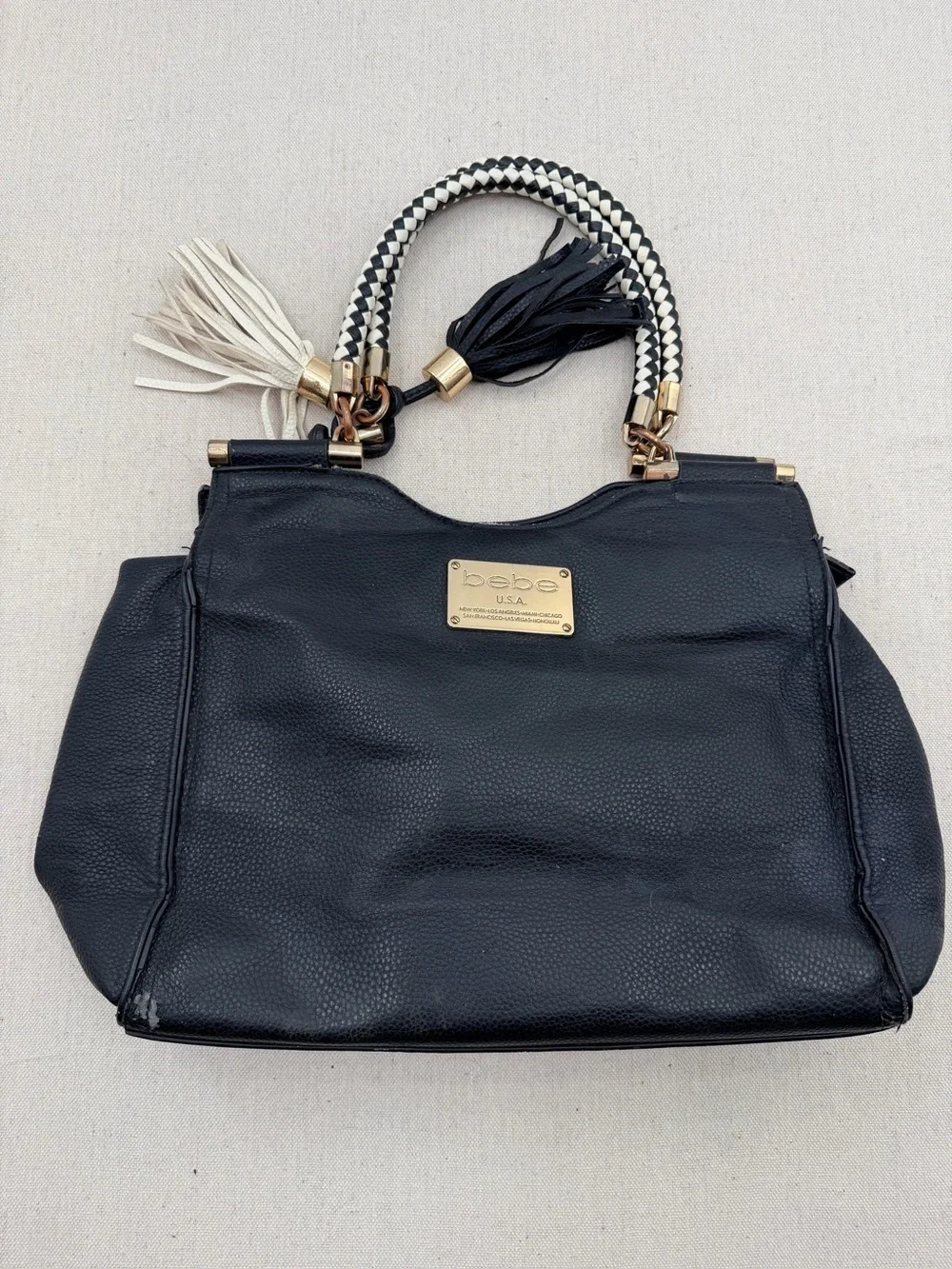 bebe Black Satchel with Braided Two-Tone Handles and Tassels